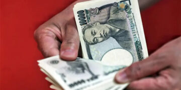 Yen trims gains against dollar after Japan’s intervention in markets