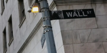 Wall Street ends higher, S&P 500, Nasdaq notch biggest monthly gains in years