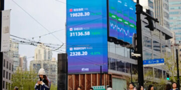 Oil sinks, Tokyo leads Asia stock surge on growing Middle East peace hopes