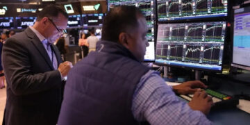 Stocks slip in cautious trading after weak US retail sales data