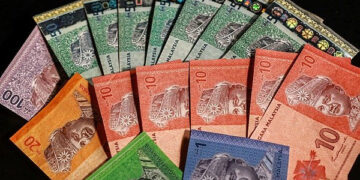 Ringgit firms against US dollar on stronger GDP growth