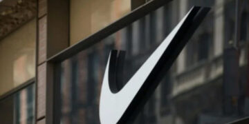 Nike plans job cuts as it forecasts lower sales