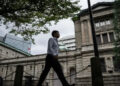 Bank of Japan says inflation hit 2% target after 13 years